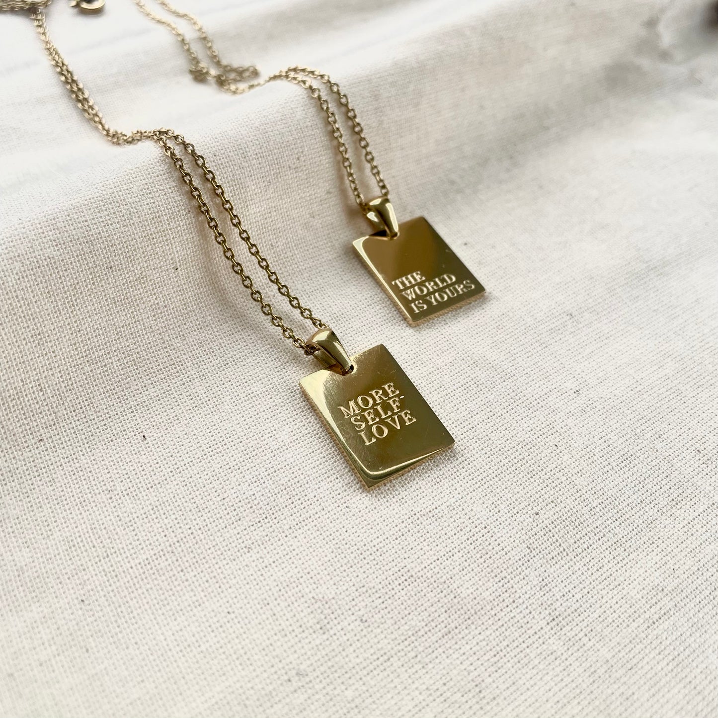 The World Is Yours Gold Pendant Necklace